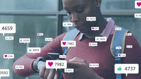 animation of social media icons with growing numbers over african american woman using smartphone