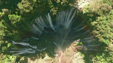 tumpak sewu rainbow waterfalls aerial scenic view timelapse capture, indonesia