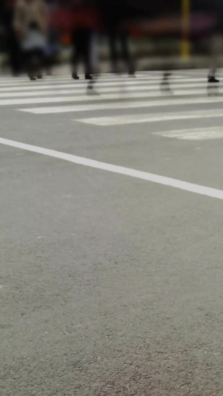 Animation of digital data processing over people crossing street in fast motion