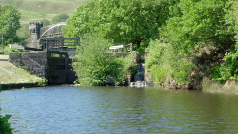 Water-flowing-in-the-Rochdale-canal-from-the-hills-of-Todmorden,-West-Yorkshire