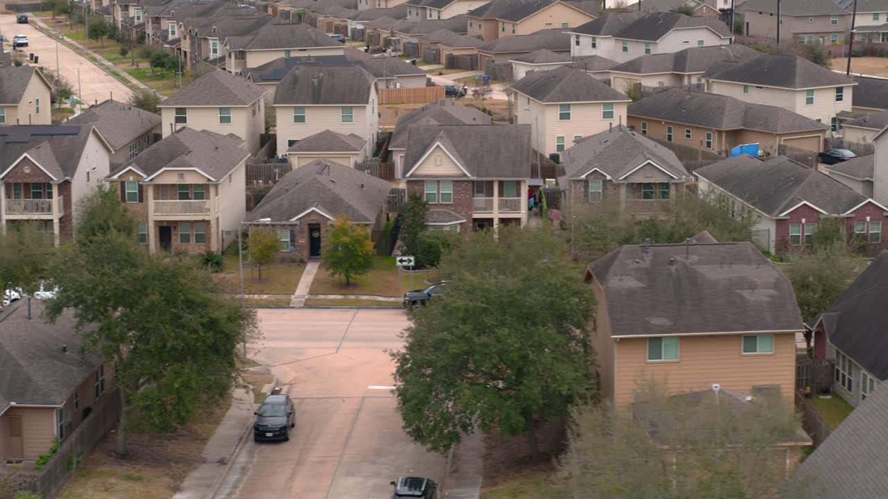 Drone view of peaceful residential homes in the Mission Bend area of Houston, Texas. Perfect for real estate and community lifestyle content