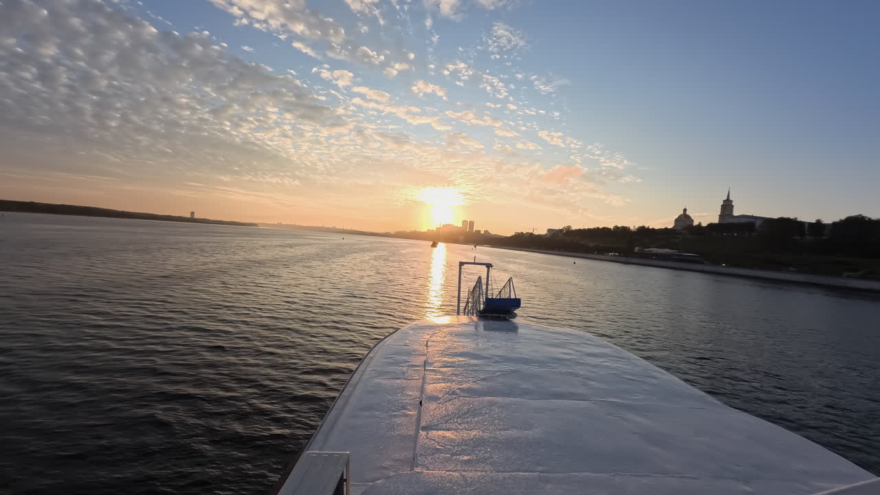 Sunset view from a boat on a river