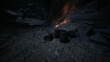 dark cave setting with barrels and flickering flames at night