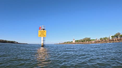 sign marking coastal bay entrance in gold coast