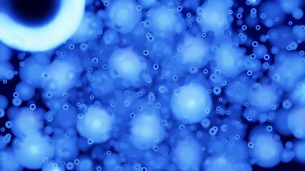 Abstract rotating blue bubbles and circles background design.