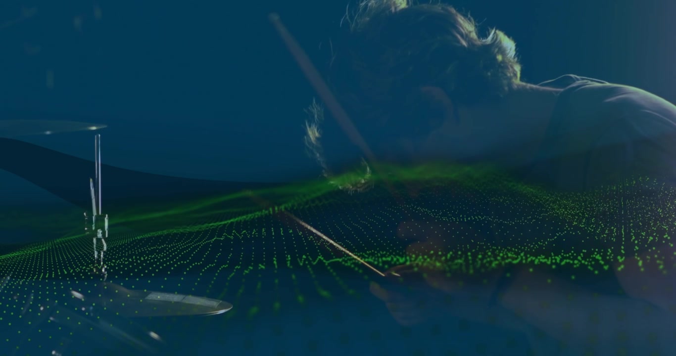 Animation of undulatinbg green digital landscape over caucasian man playing drums in slow motion