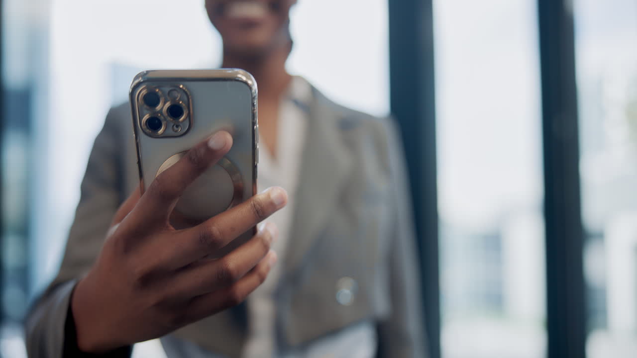Business woman holding a phone