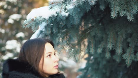 woman enjoying a snowy winter day