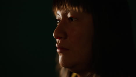 adult mexican lady portrait in the dark