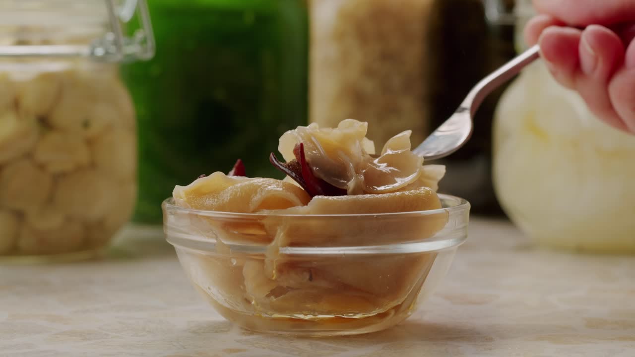 Preservation of vegetables in banks. Fermentation products. Harvesting mushrooms for the winter. Copy space. High quality 4k footage