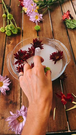 arranging flowers with crystals