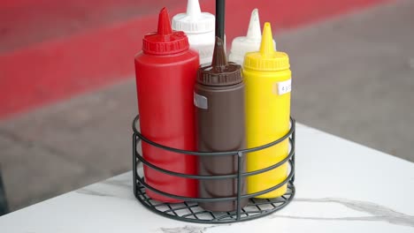 Condiment Bottles on a Table