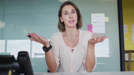 caucasian businesswoman having business talk in front of camera