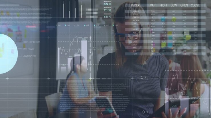 Animation of statistical data processing over caucasian woman using tablet and smartphone at office
