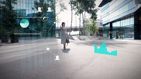 Young-model-business-woman-is-on-the-phone-in-the-courtyard-of-an-office-complex-surrounded-by-a-digitally-faded-in-network-and-data