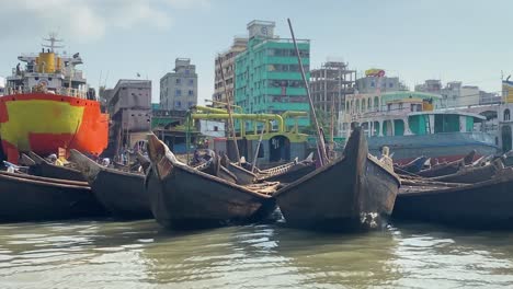 traditional wooden boats in buriganga river, dhaka port, bangladesh