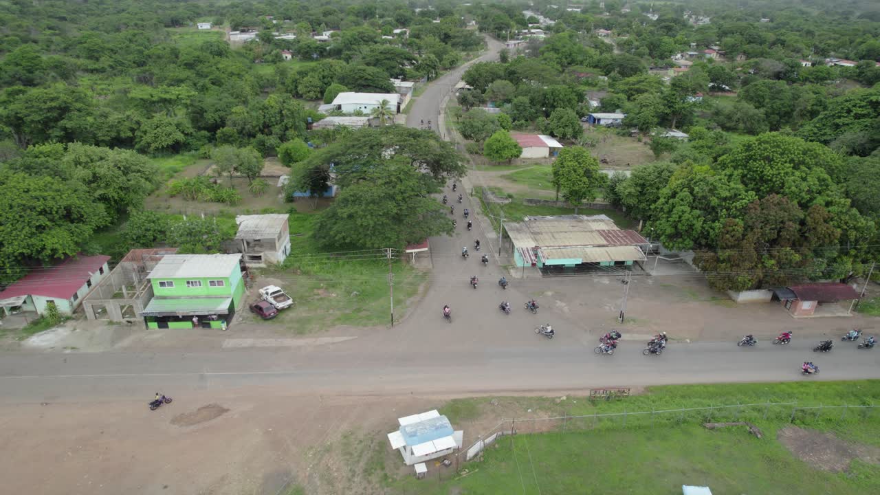 Group on motorcycles exploring rural roads for adventure and discovery