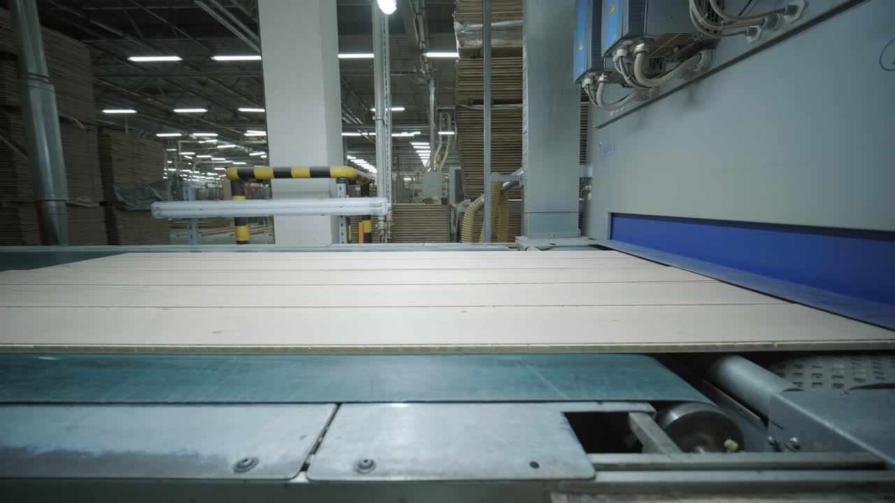 Wooden Panels Moving on Automated Conveyor Belt in Factory