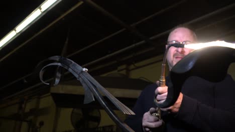 blacksmith metal forging in 120fps slow motion