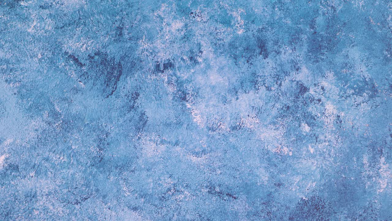 푸른 얼음 테마의 모이에 눈송이가 나타납니다. 움직임을 멈추십시오.