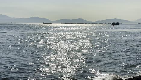 Footage of Hong Kong’s sea in the evening, showing floating water, gentle waves, and a peaceful coastal atmosphere, highlighting scenic waterfront, maritime activity, and tranquil urban waters