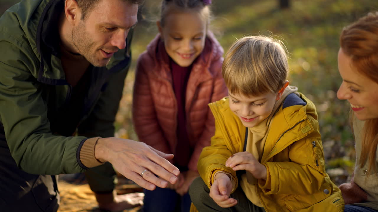 A family enjoying time together outdoors in the fall