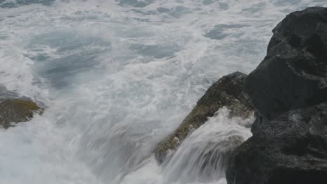 waves breaks on the rocks