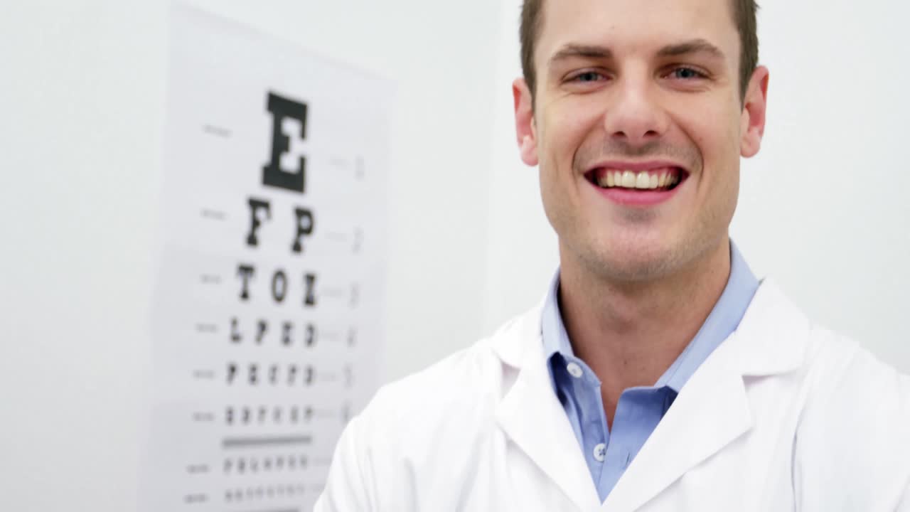 Optometrist standing in ophthalmology clinic