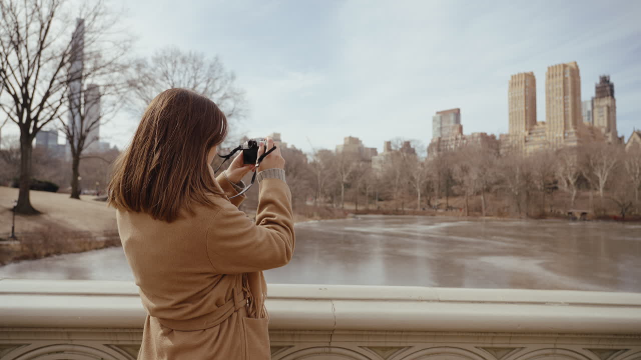 Woman Taking Photo in Central Park, New York City