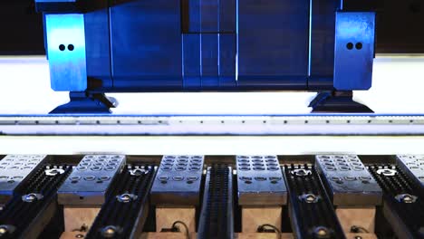 automatic machine processing sheet metal in high tech workshop