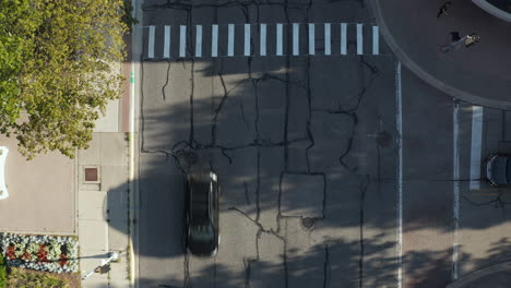 aerial top down drone view of a city road