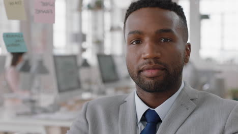 portrait african american businessman smiling confident with arms crossed happy entrepreneur enjoying successful startup company proud manager in office workspace