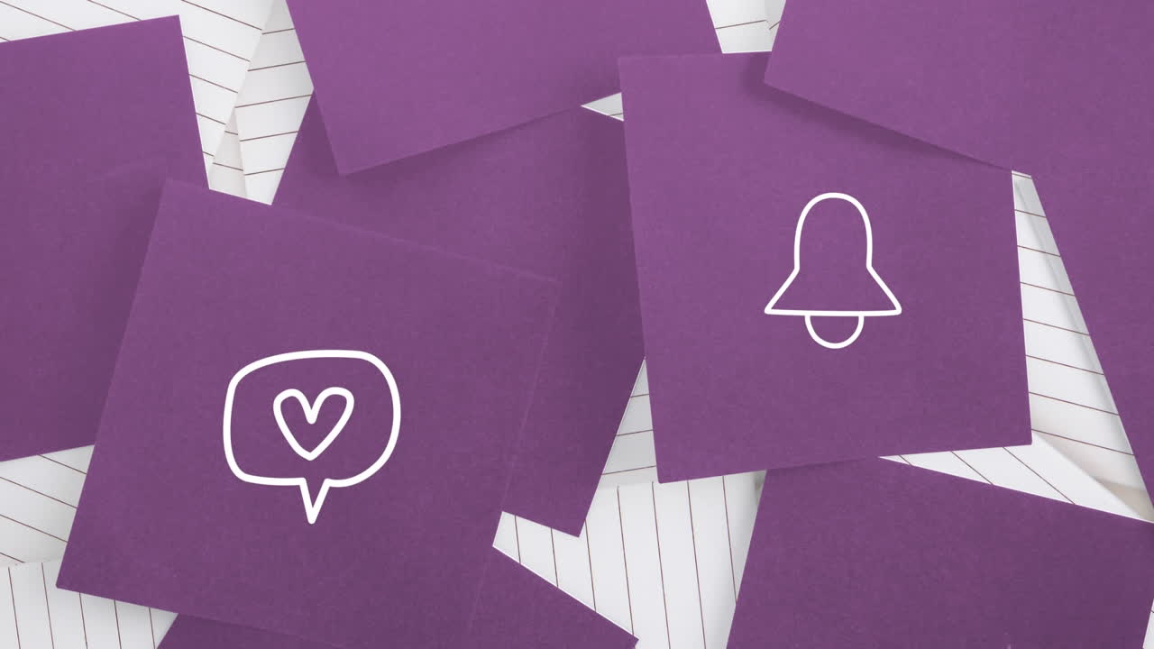 Animazione delle icone bianche di campana e di fumetto con cuore che tremolano su fogli di carta viola.