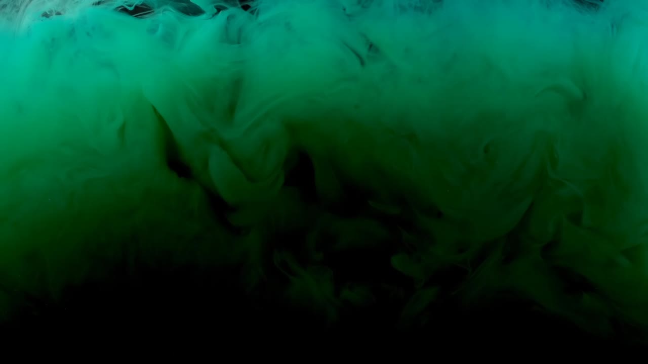 Abstracte vormen. Opnamen op een zwarte achtergrond. Mengen van verf.