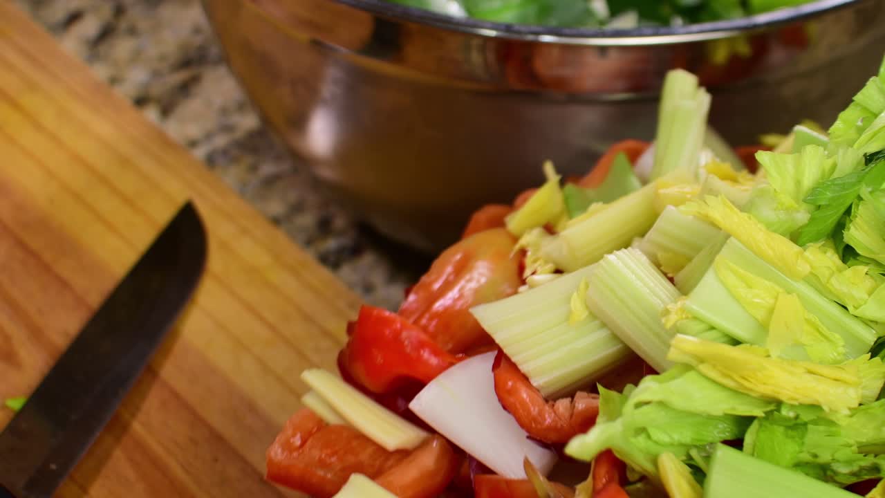 Close-up, high-quality slow-motion clip of fresh, healthy vegetables spinning, ideal for clean eating videos or recipe advertising