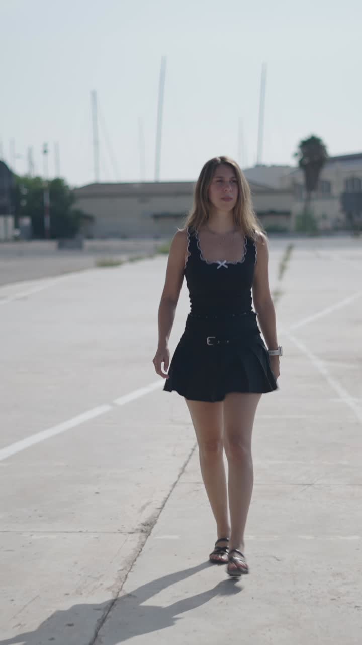 Woman walking on a paved area