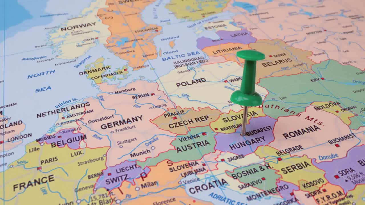 Hungary - Travel concept with green pushpin on the world map. The location point on the map points to Budapest the capital of the Hungary.