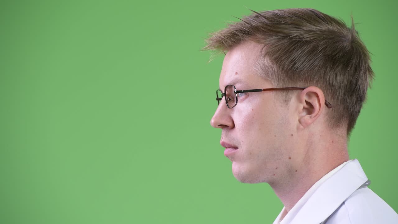 Profile View Of Happy Young Man Doctor Face