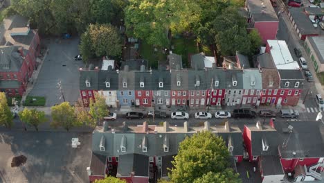 Descending-aerial-on-colorful-row-homes