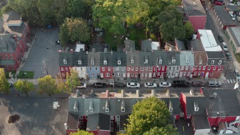 descending aerial on colorful row homes