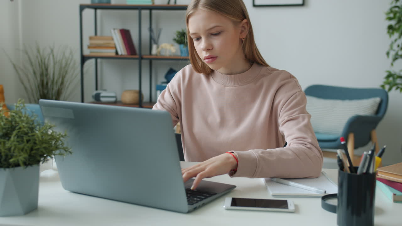 Teenage Girl Studying and Working from Home