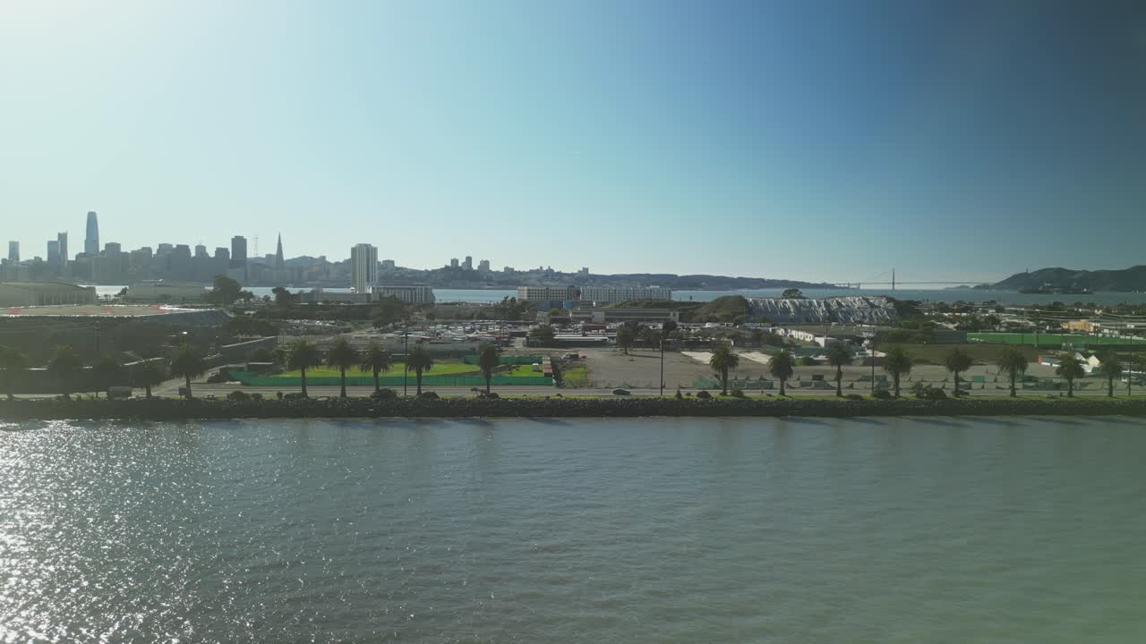 Aerial drone shot of Treasure Island in the day with San Francisco cityscape in California, USA