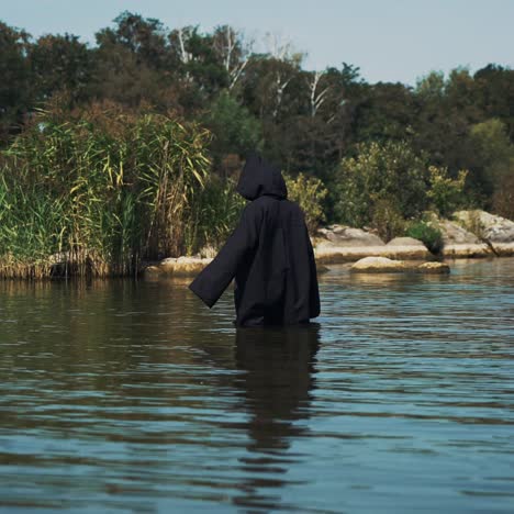 Ghost woman in the water outdoor. Divination by the water
