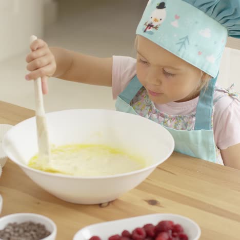 Adorable-toddler-at-mixing-bowl