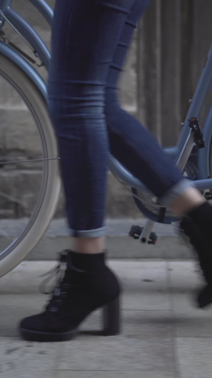 Woman Riding a Vintage Bicycle