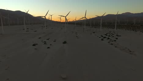 November-2023---4K-aerial-of-wind-turbines-in-Palm-Springs-Desert,-California,-USA