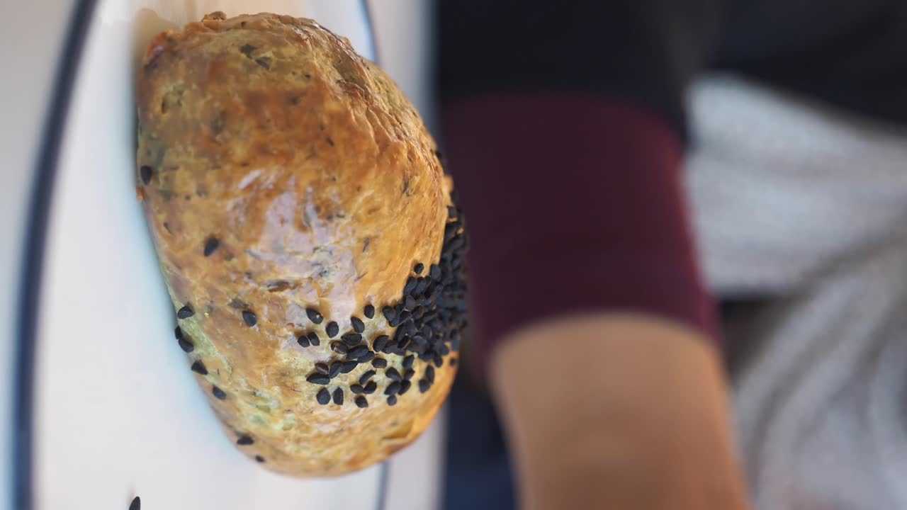Baked bread with sesame seeds