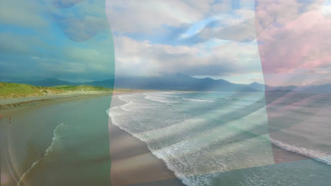 Composición-Digital-De-Ondear-La-Bandera-De-Italia-Contra-La-Vista-Aérea-De-La-Playa