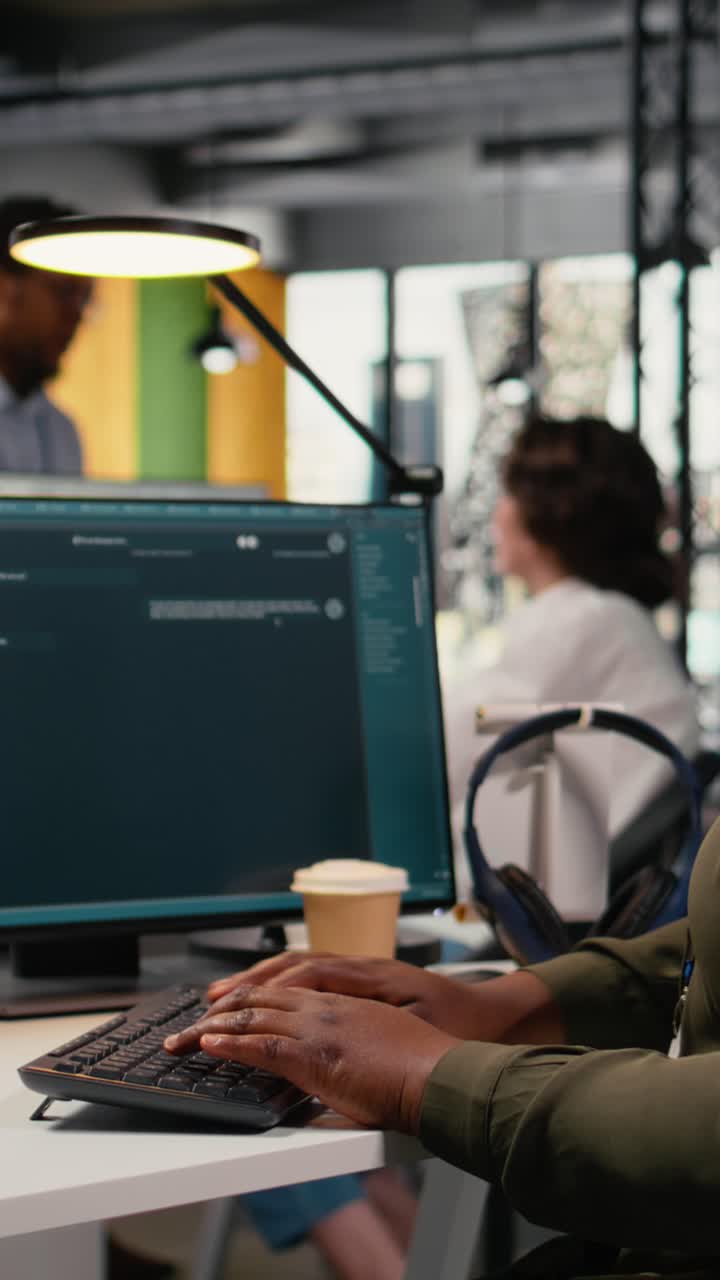 Vertical video Close up of engineer in office using AI LLM chatbot to get help