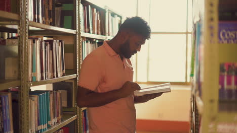 the video showcases a nepali boy around 23, reading a book at the library of the university. his focused demeanor and the peaceful environment of the library create a serene and studious atmosphere.